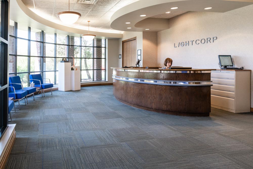 LightCorp entrance with woman at front desk