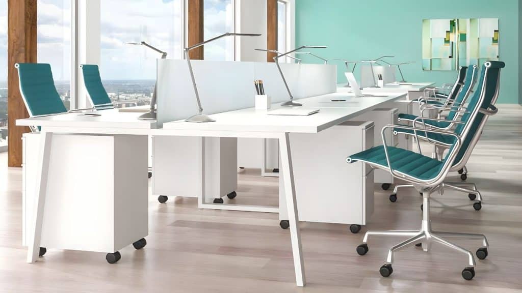 The image shows several task lighting on top of a work station. There are blue-colored chairs in the image.